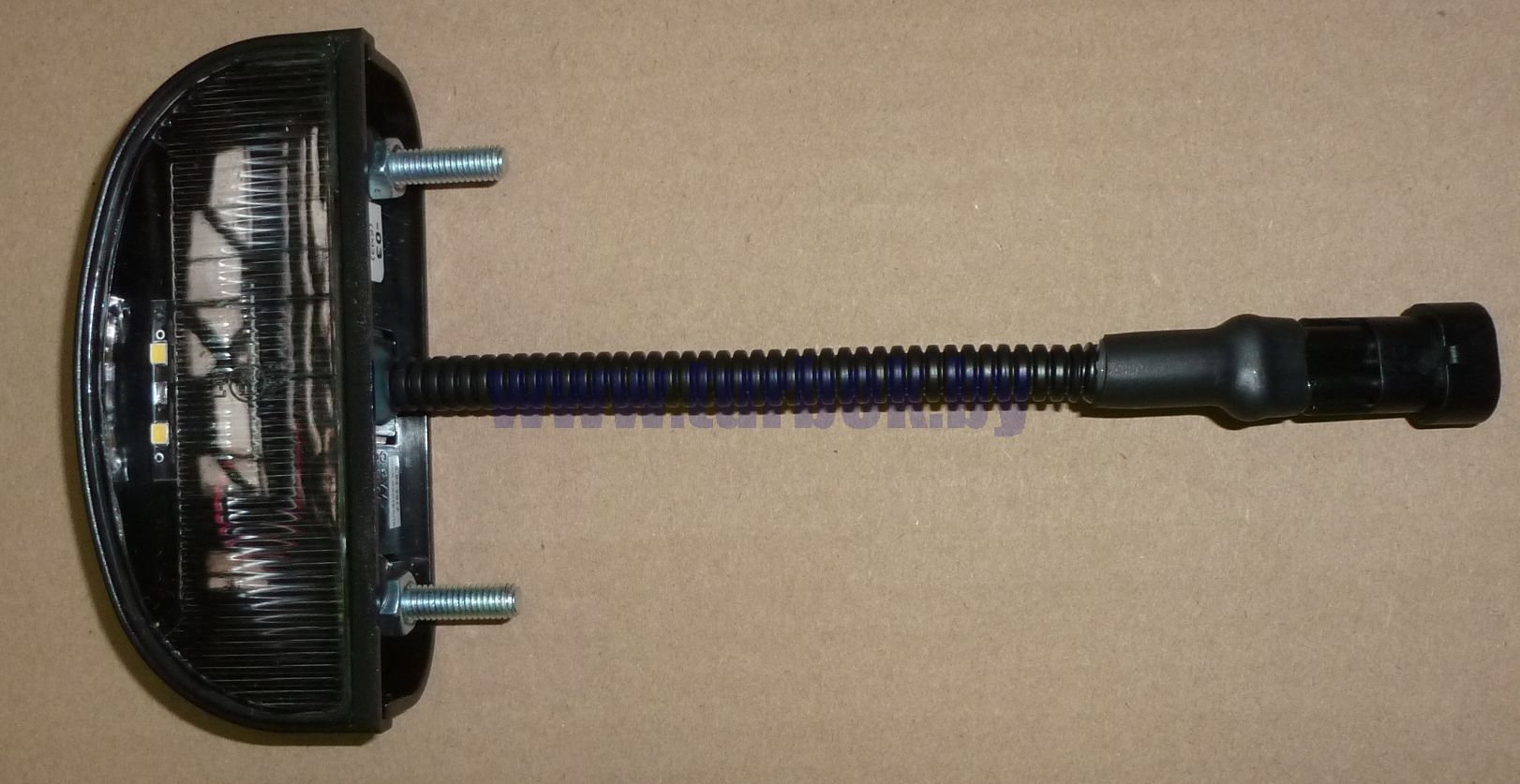 Фонарь освещения номерного знака